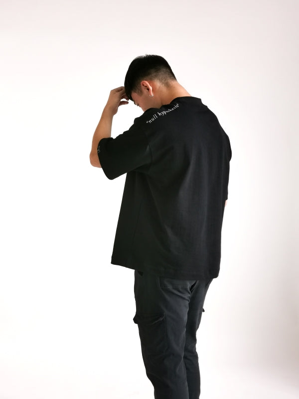 alternative hypothesis male model posing to display back view design