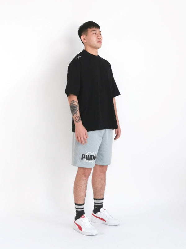 alternative hypothesis essential oversized tee design on male model to display left diagonal side view