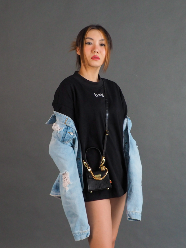 null hypothesis female model wearing denim jacket standing