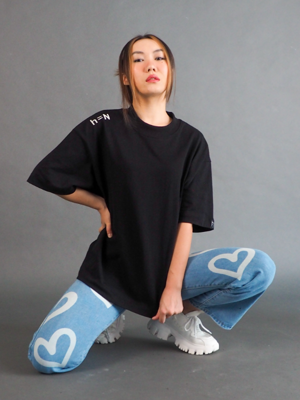 null hypothesis female model wearing denim jacket squatting