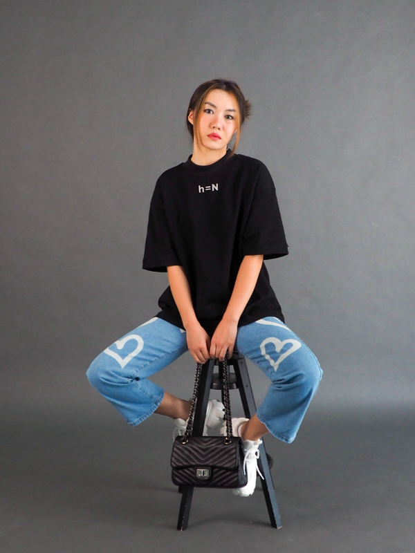 null hypothesis female model with jean and handbag