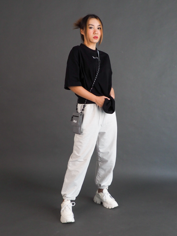 null hypothesis female model wearing joggers standing