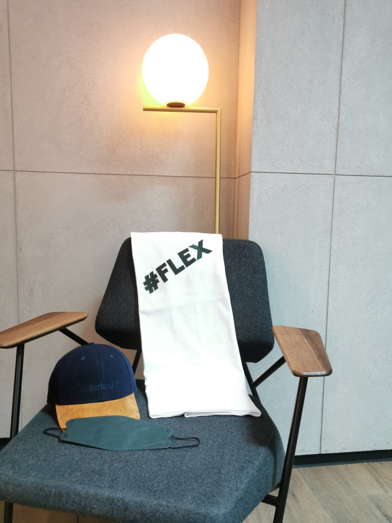#flex design tshirt placing on the chair with a cap and a facemask