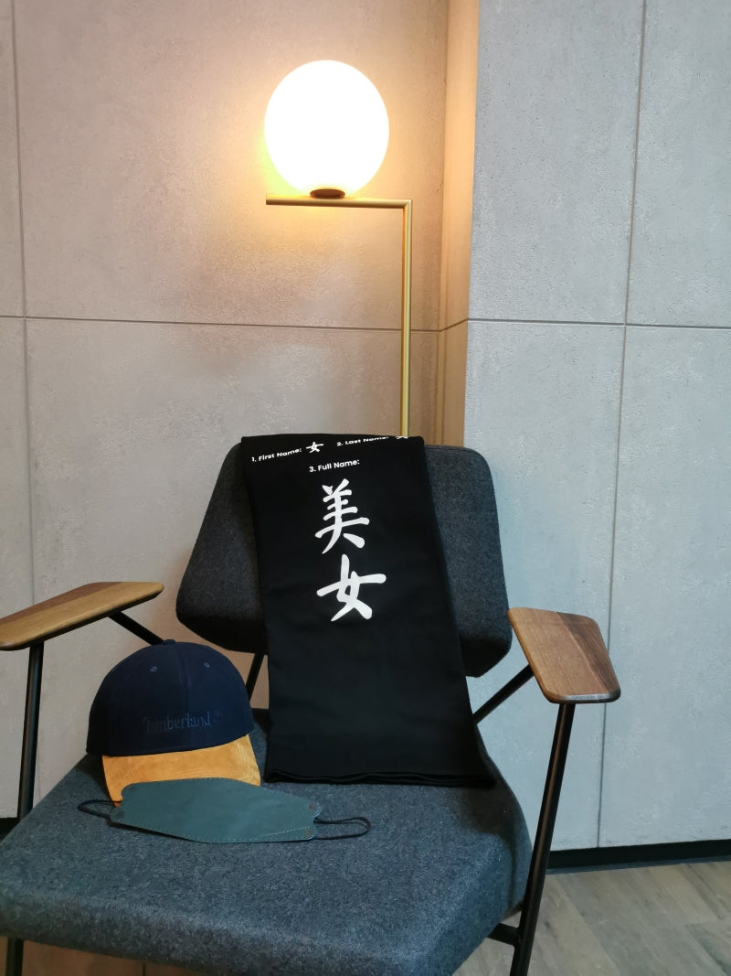 pretty girl design tshirt placing on the chair with a cap and a facemask